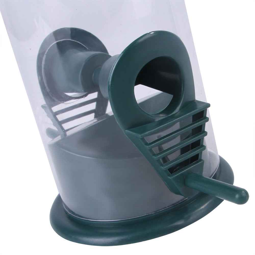 Outdoor hanging bird feeder plastic food dispenser close-up